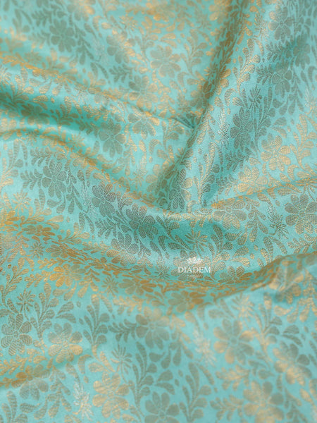 Aqua Blue Pure Kanchipuram Bridal Silk Saree with Flower Jacquard Design on the Body with Contrast Border - Diadem