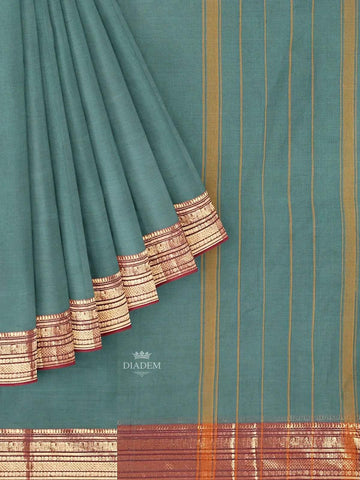 Green Kanchi Cotton Saree with Plain Thread Butta on the body and Zari Border - Diadem