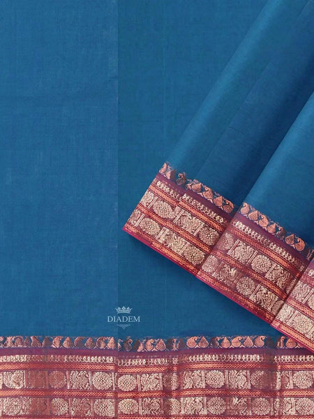 Peacock Blue Kanchi Cotton Saree with Plain Thread Butta on the body and Zari Border - Diadem