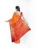 Orange Art Silk Saree With Floral Motif On the Body with Contrast Zari Border