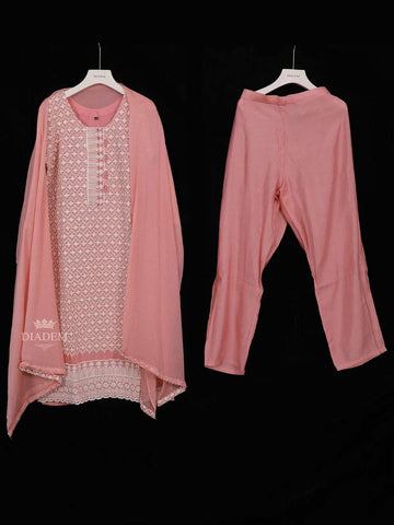 Peach Cotton Straight Cut Salwar Suit for Girls Adorned with Floral Threadwork Embroidery, paired with Dupatta - Diadem