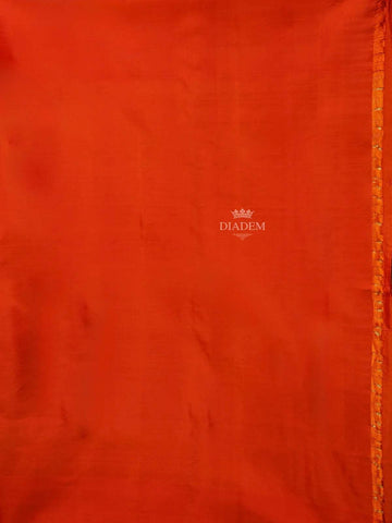 Orange Soft Silk Saree with Zari Butta Design on the Body with Contrast Border - Diadem