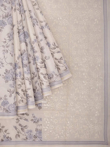 Ivory and Blue Organza Silk Saree with Floral Prints on the body and Embroidery Border - Diadem