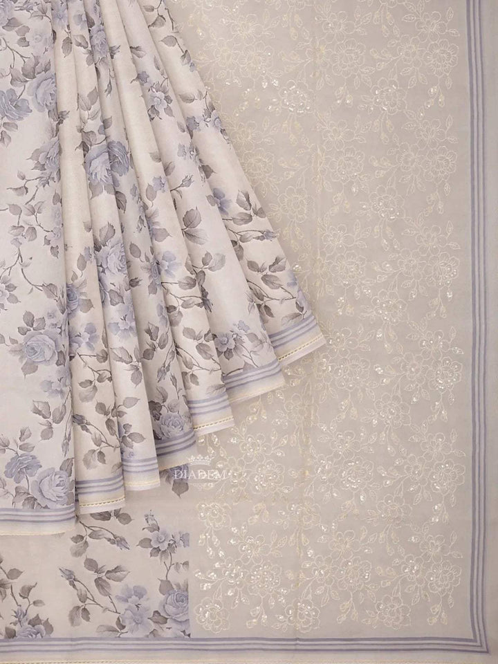 Ivory and Blue Organza Silk Saree with Floral Prints on the body and Embroidery Border - Diadem