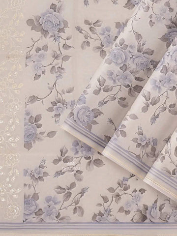 Ivory and Blue Organza Silk Saree with Floral Prints on the body and Embroidery Border - Diadem