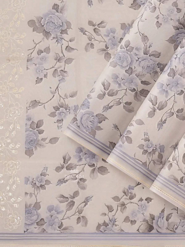 Ivory and Blue Organza Silk Saree with Floral Prints on the body and Embroidery Border - Diadem