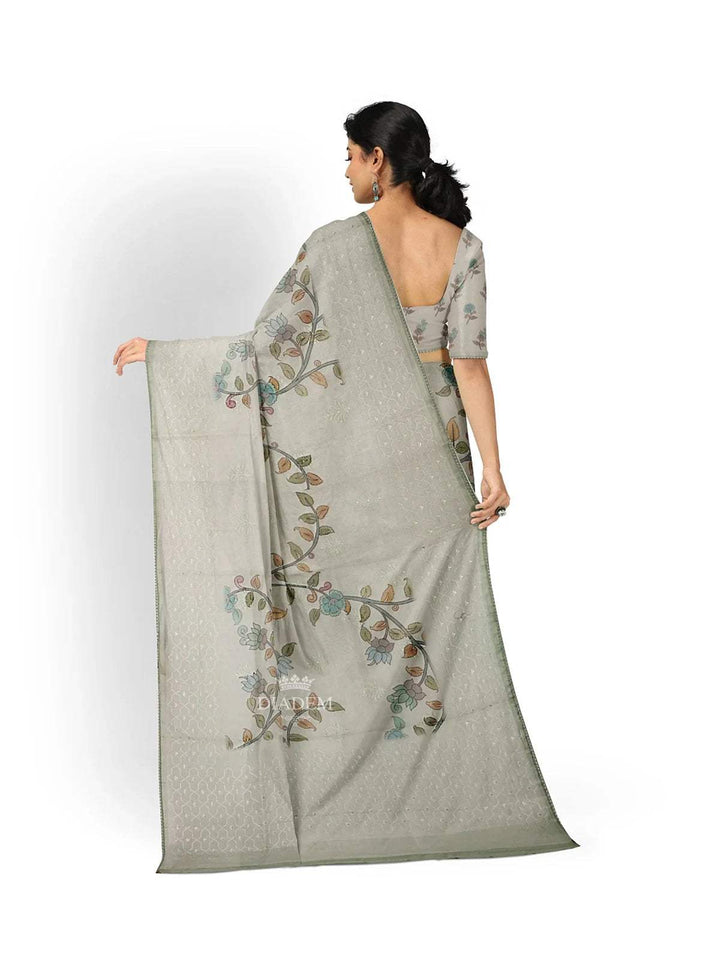 Light Green Organza Silk Saree with Floral Prints on the body and Embroidery Border - Diadem