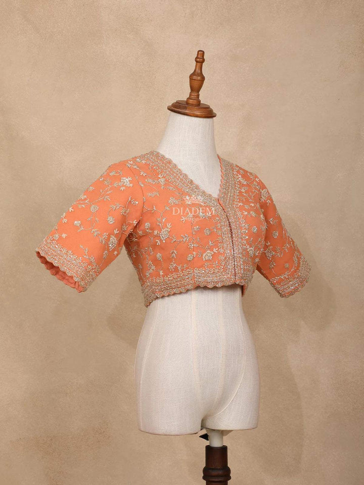 Orange Organza Saree with Stripes Designs on the body and Embroidery Border - Diadem