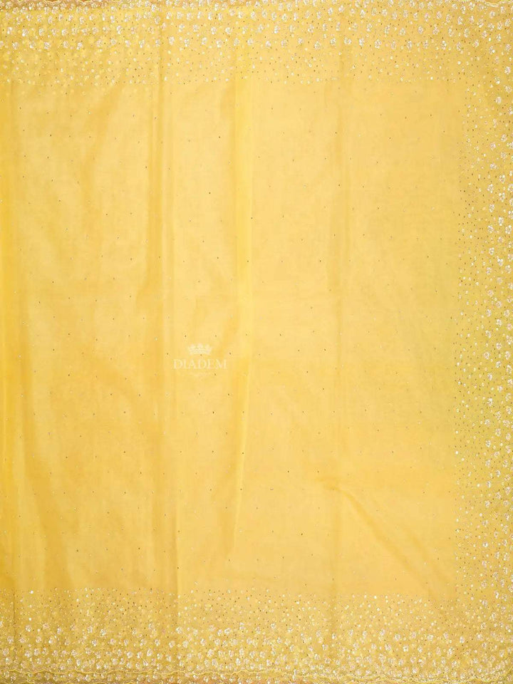 Yellow Organza Saree with Embroidery Design on the Body and with Designed Border - Diadem