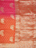 Orange and Pink Semi Banarasi Saree with Floral Designs on the body and Zari Border