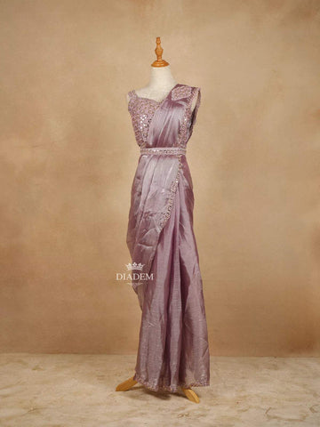 Lavender Chiffon Saree with Plain body and Embroidered Border paired with Designer Blouse and Waist Belt - Diadem