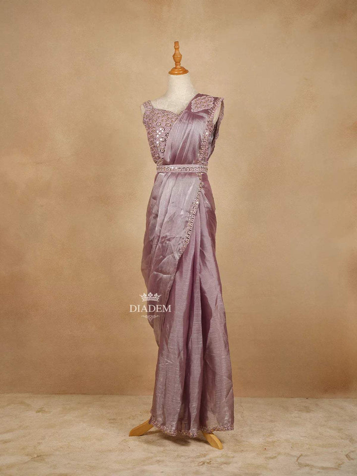 Lavender Chiffon Saree with Plain body and Embroidered Border paired with Designer Blouse and Waist Belt - Diadem