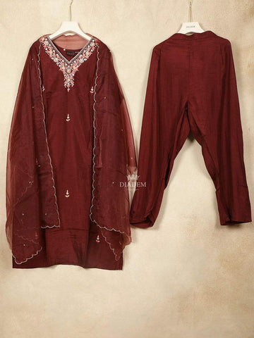 Maroon Crepe Straight Cut Salwar Suit for Girls Adorned with Thread work and Flower Design, Paired with Dupatta - Diadem