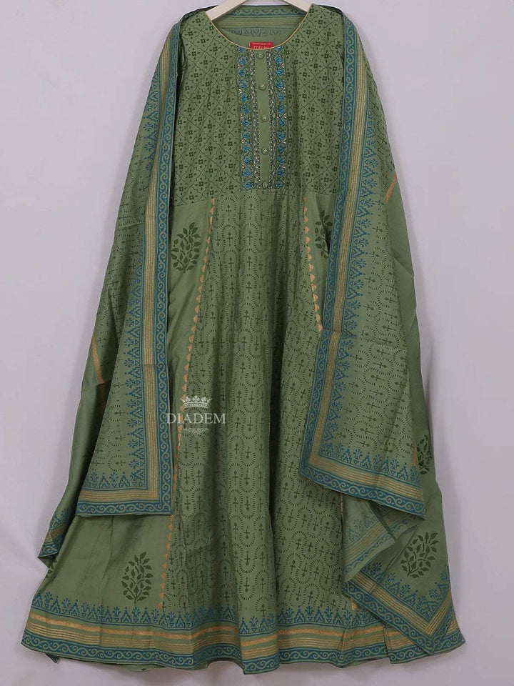 Green Cotton Straight Cut Salwar Suit Adorned with Floral Prints, paired with Dupatta - Diadem