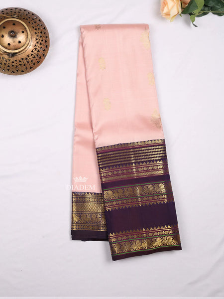 Light Peach Pure Kanchipuram Bridal Silk Saree with Zari Butta on the body and Contrast Zari Border - Diadem