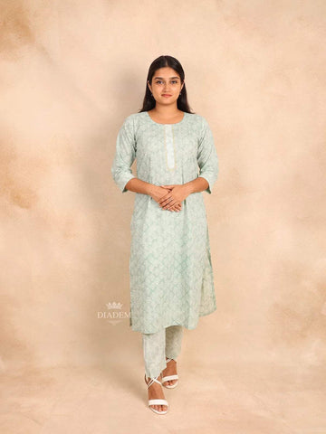 Mint Green Cotton Straight Cut Salwar Suit Adorned with Floral Prints and Sequins - Diadem