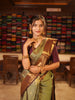 Antique Olive Green Jhumka Butta Zari Woven Design Semi Silk Traditional Wear Saree with Contrast Pallaku Zari Border
