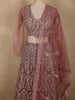 Antique Rosewood Mauve Pink Zari Embroidered and Stone Embellished Design Net Lehenga With Net Dupatta