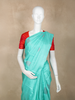 Aqua Blue Butta Woven Design Pure Kanchipuram Silk Saree with Contrast Red Blouse