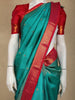 Aqua Blue Butta Zari Woven Design Pure Kanchipuram Silk Saree with Contrast Border