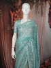 Aqua Blue Heavy Sequins and Thread Embroidered Design Organza Party Wear Saree with Designer Border