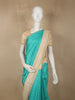 Aqua Green Checked Woven Design Pure Kanchipuram Silk Saree with Contrast Woven Border