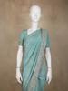 Aqua Green Sequins and Thread Embroidered Satin Saree with Designer Border