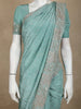 Aqua Green Sequins and Thread Embroidered Satin Saree with Designer Border