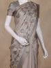 Beige Grey Floral Design Tissue Silk Saree with Zari Border