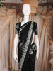 Black Solid Design Chiffon Saree with Contrasting Leaf Motif Border