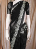 Black Solid Design Chiffon Saree with Contrasting Leaf Motif Border