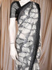 Black and White Abstract Printed Design Chiffon Saree with Contrast Black Pattern Border