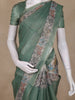Bottle Green Animal Motif Design Tissue Silk Saree with Zari Border