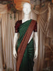 Bottle Green Butta Zari Woven Design Pure Kanchipuram Silk Saree with Contrast Zari Border