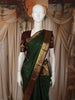 Bottle Green Butta Zari Woven Design Pure Kanchipuram Silk Saree with Contrast Zari Border