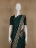 Bottle Green Solid Design Raw Silk Saree with Zari Border