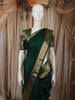 Bottle Green Solid Woven Design Pure Kanchipuram Silk Saree with Zari Border