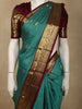 Bright Aqua Blue Mini checked and Butta Zari Woven Design Pure Kanchipuram Silk Saree with Contrast  Floral Zari Border