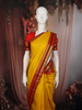 Bright Mustard Yellow Butta Zari Woven Design Pure Kanchipuram Silk Saree with Contrast Varisai Pattu Border