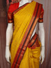 Bright Mustard Yellow Butta Zari Woven Design Pure Kanchipuram Silk Saree with Contrast Varisai Pattu Border