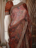 Burnt Cinnamon Brown Floral Woven Design Pure Tissue Silk Fancy Saree with Sequins Border