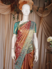 Burnt Copper Pink Floral Woven Design Pure Kanchipuram Silk Saree with Contrast Zari Border