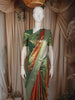 Burnt Orange and Green Floral Zari Woven Design Tissue Silk Fancy Saree with Zari Border