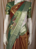 Burnt Orange and Green Floral Zari Woven Design Tissue Silk Fancy Saree with Zari Border
