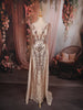 Champagne Beige Abstract Sequins Embroidered Design Mermaid Sequins Fabric Party Wear Gown with Cape Sleeve