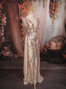 Champagne Beige Abstract Sequins Embroidered Design Mermaid Sequins Fabric Party Wear Gown with Cape Sleeve