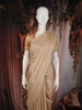 Champagne Beige Butta Woven Design Soft Tissue Saree with Scalloped Border