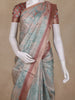 Champagne Beige Floral Design Tissue Silk Saree with Zari Border