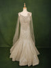 Champagne Gold Geometric Sequins and Beads Embroidered Design Net Mermaid Bridal Lehenga with Designer Corset Blouse and Cape Sleeves