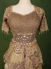 Champagne Gold Heavy Sequins and Beads Embroidered Design Tissue Silk Peplum Lehenga with Matching Dupatta